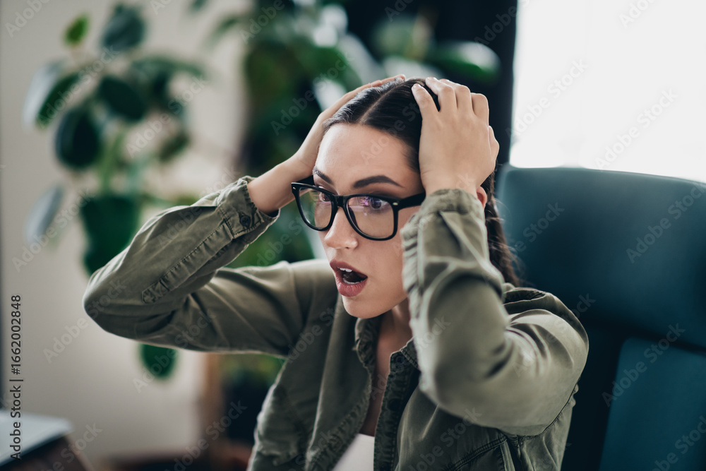 Poster qualified specialist expressing overwhelmed emotion while working on a computer in a modern home off