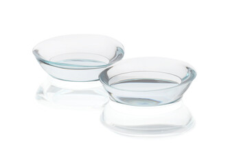 Pair of contact lenses isolated on white