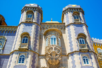 Sintra, Portugal - July 8 2025: The beautiful decorated windows of Pena Palace in Sintra, Portugal © Vincent Jiang