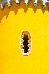 Sintra, Portugal - July 8 2025: The beautiful decorated windows of Pena Palace in Sintra, Portugal