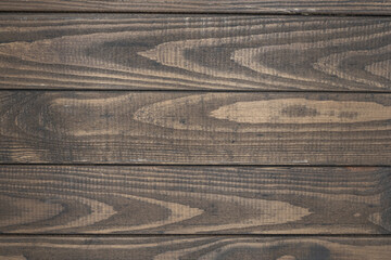 Rustic wooden plank texture background. Close-up of natural brown wood surface with detailed grain,...