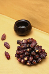 Exotic Date Arrangement: A close-up studio shot reveals a rich array of dates, meticulously...