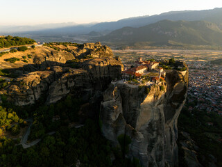 Fototapeta premium Meteora Monasteries at Sunset Aerial View of Greece's Cliffside Heritage