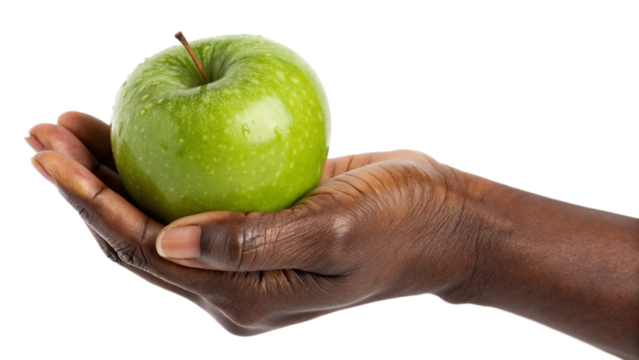 A Ripe Green Apple Resting Gently on a Person's Outstretched Hand