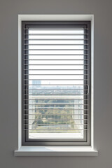 Fototapeta premium Natural Light Filtering Through Window Blinds – Calm Room Atmosphere