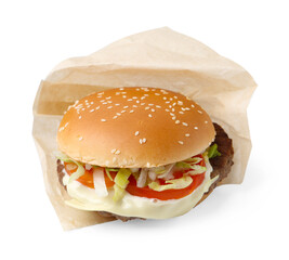 One delicious burger with cheese, tomato, lettuce and patty in takeaway package isolated on white....