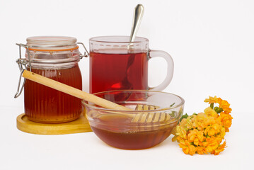 A Deliciously Inviting Composition of Honey and Herbal Tea Infused with a Floral Accent