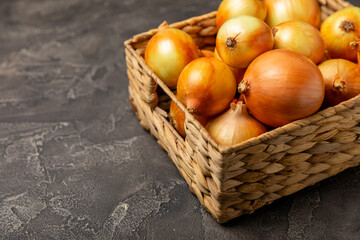 Onion on the kitchen table. onion slice. onion rings. Fresh Yellow Onion. Natural, fresh, vegetarian food. Agricultural products. Healthy eating. Vegetables. Farmer's market. Space for text.Copy space