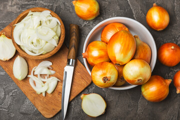 Onion on the kitchen table. onion slice. onion rings. Fresh Yellow Onion. Natural, fresh, vegetarian food. Agricultural products. Healthy eating. Vegetables. Farmer's market. Space for text.Copy space