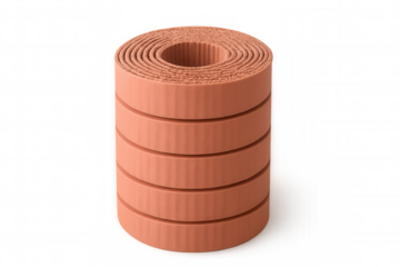 Orange yoga mat tightly rolled, lying flat against transparent backdrop, highlighting fitness preparedness