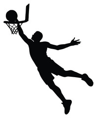 Obraz premium Silhouette of basketball player dunking ball into hoop with dynamic energy