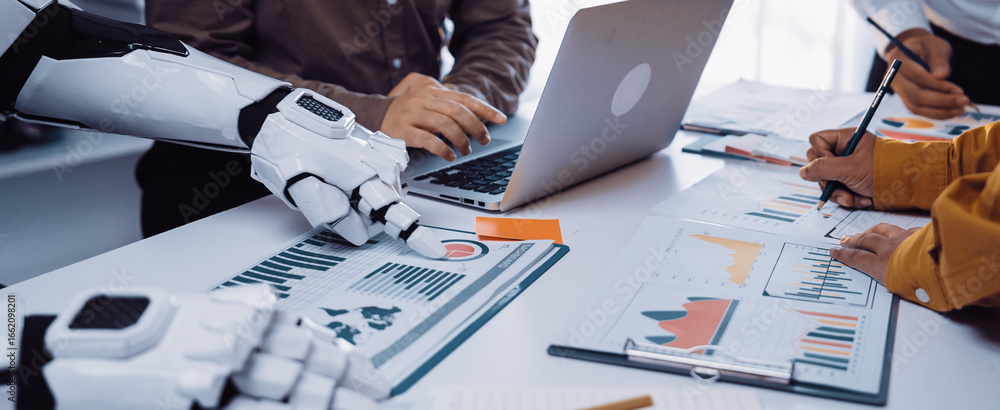 Poster a dynamic business meeting illustrates the synergy between human and robot as they analyze charts an