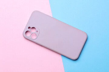 Purple protective case for smartphone on pink blue background