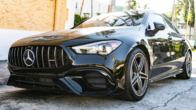 Miami, Florida, USA - November 23, 2024: Mercedes Benz CLA sedan. Luxury car of Mercedes Benz CLA AMG sedan type. Car of Mercedes Benz parked outdoor. Mercedes Benz CLA, side view.