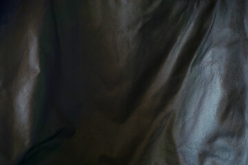 black cloth background abstract with soft waves