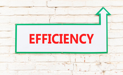 Obraz premium Efficiency symbol. Concept word Efficiency on beautiful white sign on old white brick wall. Beautiful brick old white wall background. Business efficiency concept. Copy space.