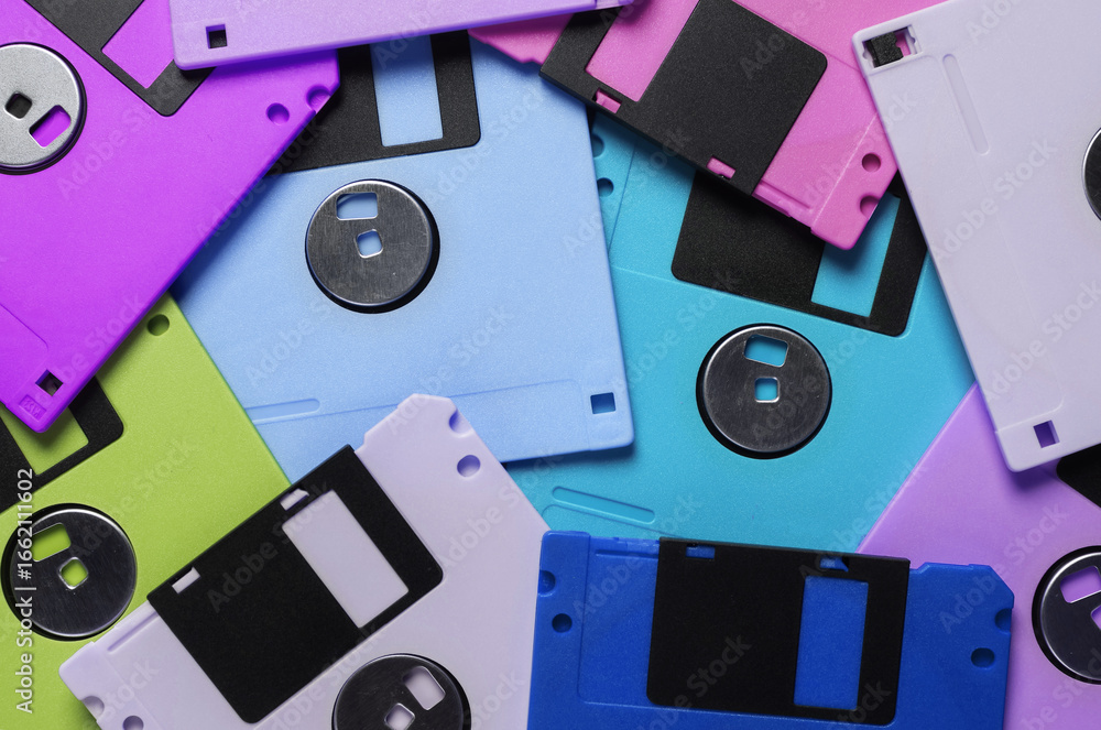 Poster background of many colored retro floppy disks