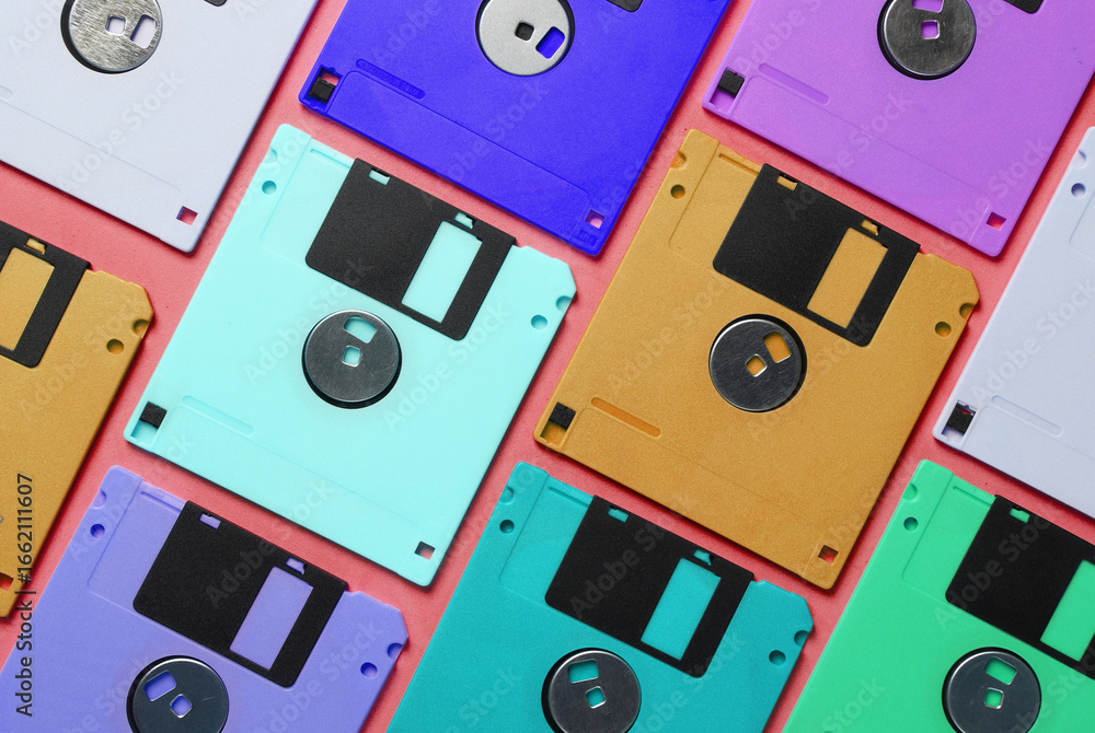 Poster pattern of many colored floppy disks. retro technology. top view
