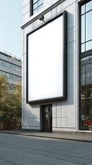 Blank billboard on urban building facade