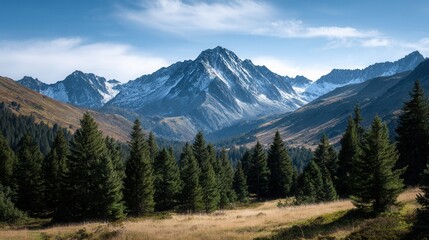 Fototapeta premium A breathtaking view of snow-capped mountains surrounded by lush pine forests under a clear blue sky, ideal for nature and travel themes.