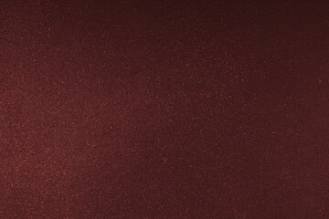 Abstract shiny, radiant texture background with different shades of dark red color. Painted canvas,...