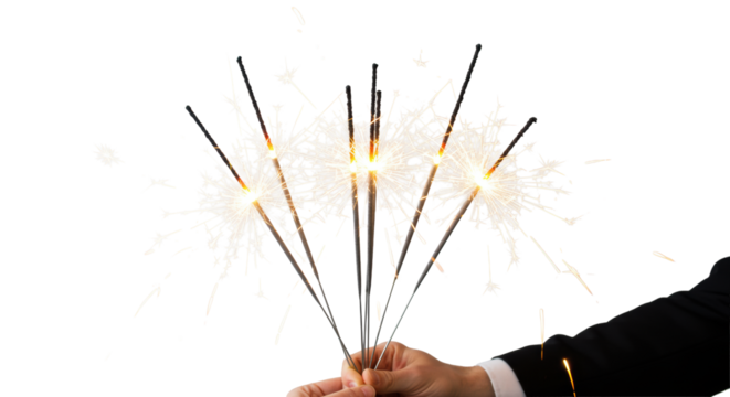 Vibrant cluster of sparklers emitting bright golden sparks and dynamic light trails, held by subtle hands with crisp white cuffs, against a transparent studio background. Concept of professional