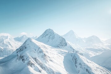 Fototapeta premium Snow-Capped Mountains Under Clear Blue Sky