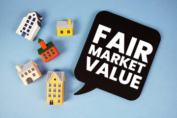 FMV Fair Market Value text with house models on blue background