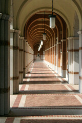 Architectural Brick and Archway Corridor
