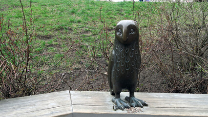 Riga, Latvia. Head of bronze owl sculpture at the Old Town`s Doma Square playground, designed by...