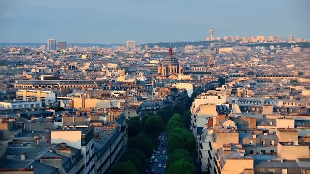 Paris, France. Aerial view of Paris during the golden hour, with a focus on the cityscape below. The cityscape is a mix of residential and commercial buildings, with the iconic St.
