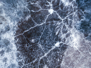 Aerial view of cold wetlands and white steam in Poland.