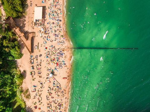 Fototapeta View from above crowd and summer tourism at Baltic Sea.