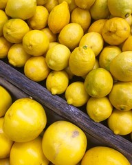 lemons in a box at market