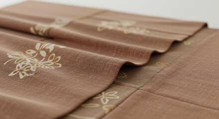 Elegant Brown Textile with Delicate Gold Floral Embroidery and Gentle Folds – High-Quality Fabric Detail