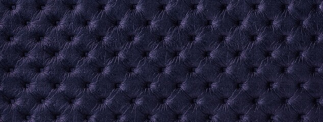 Dark violet leather texture with capitone pattern, macro background of indigo retro Chesterfield vintage textile fabric