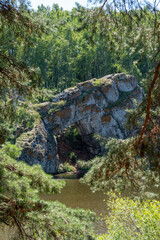 Natural monument is Stone Gate rock on Iset River, limestone rock with arch in form of through...