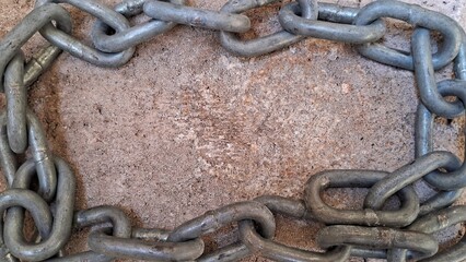 Metal Chain Frame on Concrete Surface