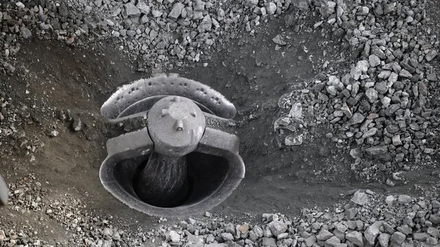 Crusher for stones, Processing plant on open pit mine. Ore is crushed to recover copper, gold, iron.