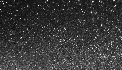 Dark gray glitter bokeh texture background. New Year, Christmas and celebration background concept.