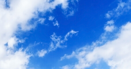 Blue sky with white fluffy cloud. Cloudscape cumulus summer soft light sky. Beautiful nature morning. Freedom of life concept.