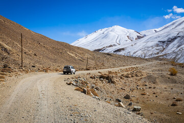 Off-road vehicle at the Pamir highway in Tajikistan