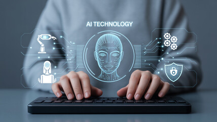 AI Technology Concept with Humanoid Face and Digital Circuitry Displayed on Screen with Person Typing on Keyboard