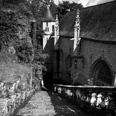 Fototapeta premium Le Faouet Morbihan Ancient Stone Wall with Arches in Black and White