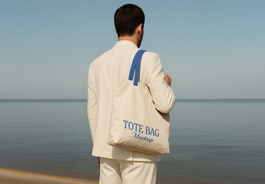 Mockup of Man Holding Tote Bag on Shoulder