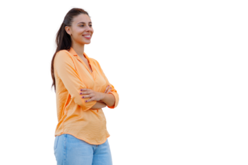 Cheerful young woman crossing arms, turning head and smiling during studio photoshoot with transparent background