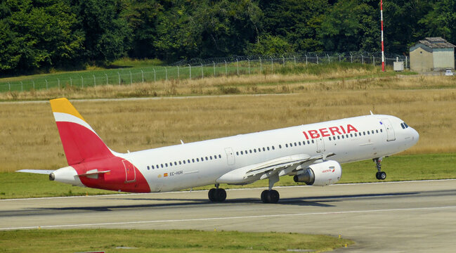 Geneva, Switzerland - august 22, 2025 : sign and logo on a plane of Iberia Spanish airline take off from  Geneva Airport