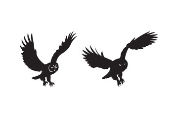 Silhouette of two majestic owls in flight with wings spread wide capturing nature's beauty