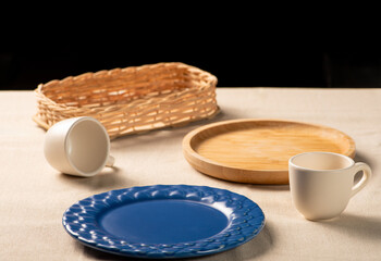 Table with empty rustic utensils from Brazil, selective focus.
