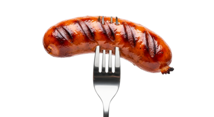 A grilled sausage pierced by a metal fork against a stark studio shot food photography